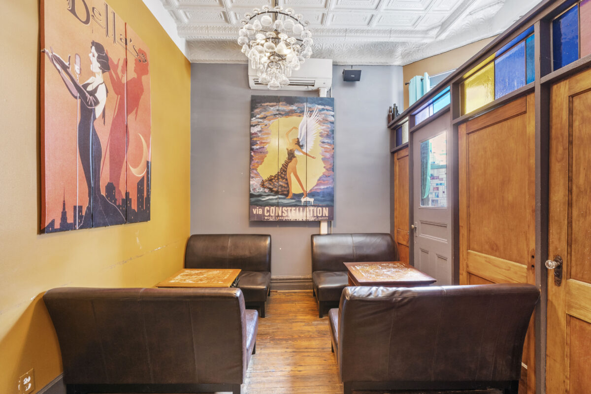 Interior hallway with natural light and vintage wood trim