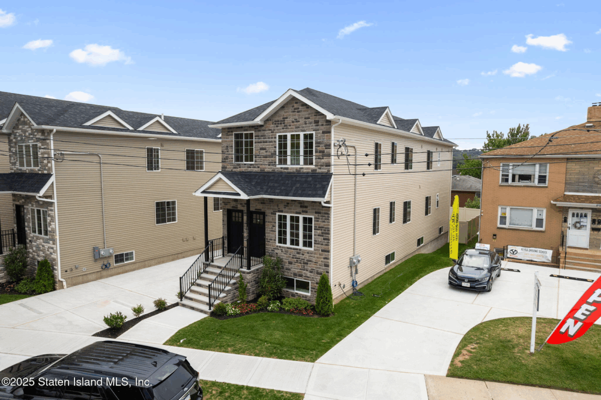 Exterior view of two-family home for sale in Sunnyside, Staten Island.